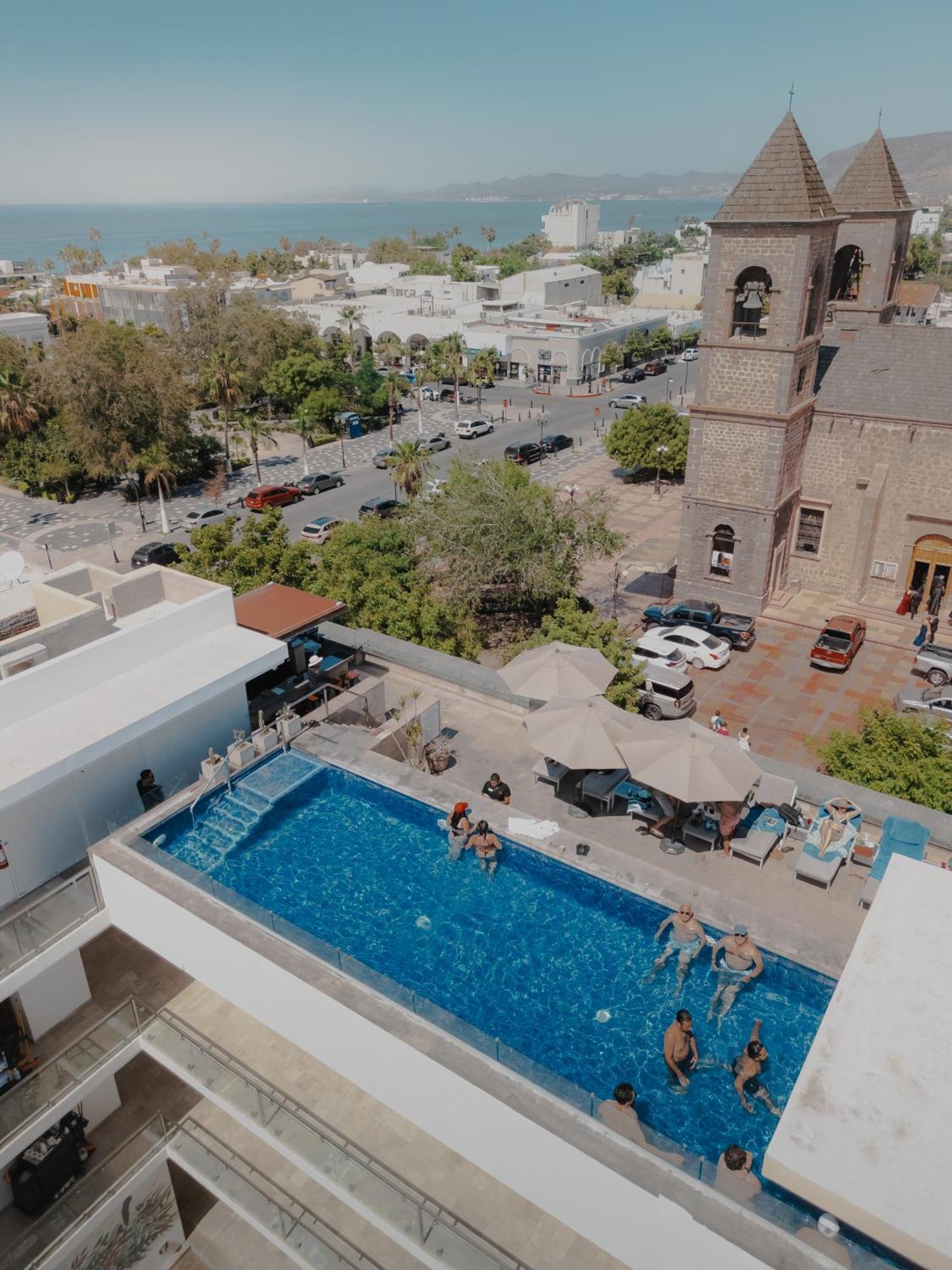 Hotel Catedral La Paz Bagian luar foto Aerial view of the rooftop pool at the Hotel Indigo, Perth